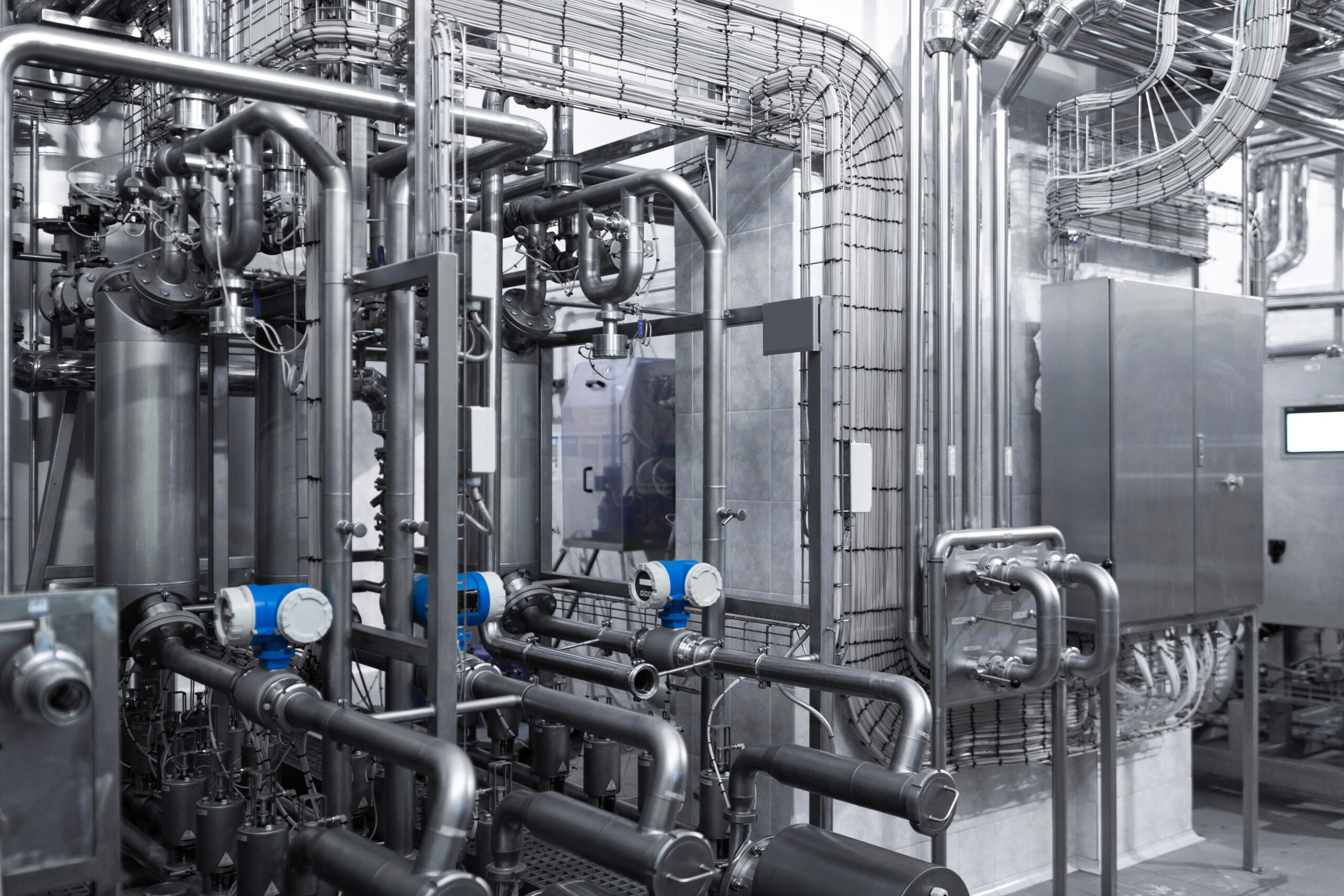 Industrial zone,The equipment of oil refining,number of electric motors with reducers. Food industry. Details distribution system of a modern brewery. Equipment and industrial tools